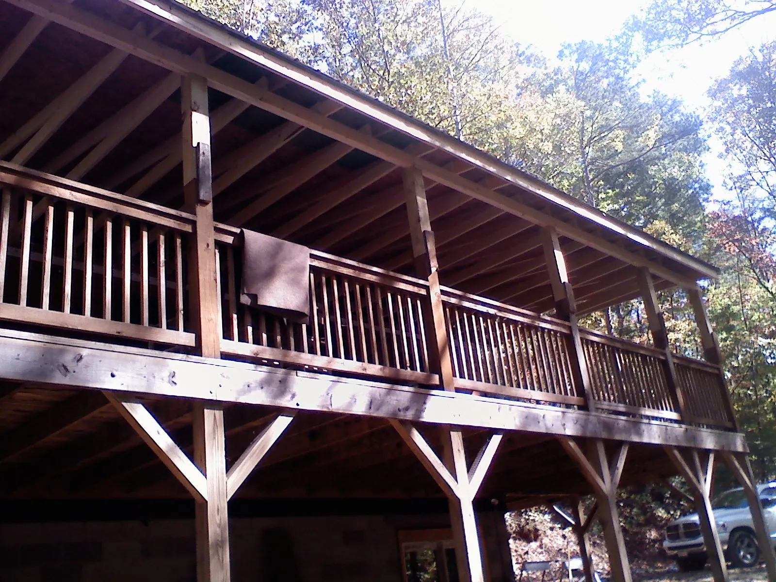 Timber framing under a new elevated porch and deck — Roof Leak Repair in Hooker by Roofing Brothers